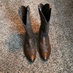 Frye women’s brown cowboy boots.
